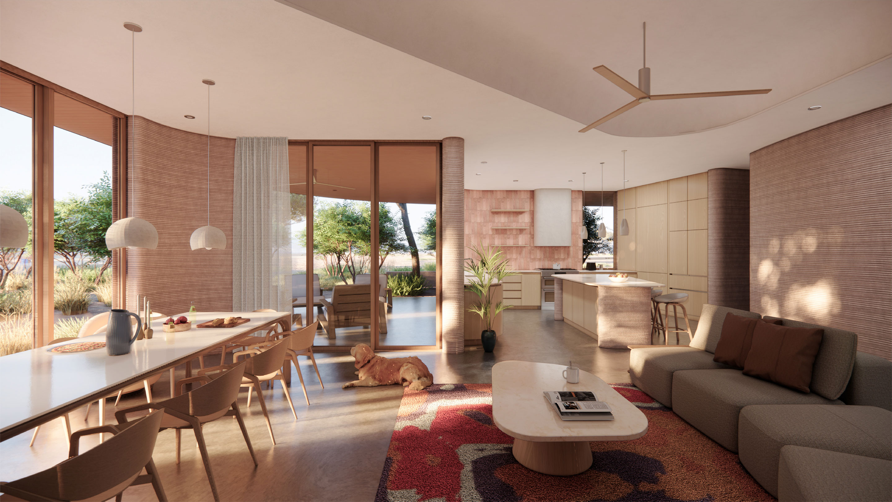 The open-plan living room and kitchen of an ICON home, curved plaster walls and full-height glass sliding open onto a planted courtyard